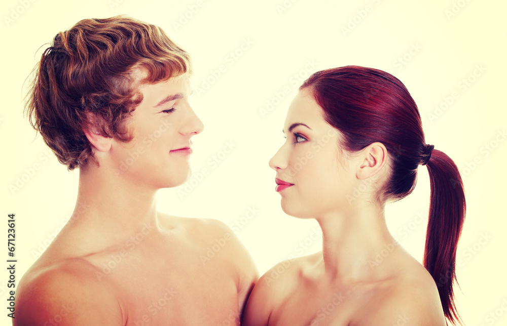 Topless couple standing Topless couple standing