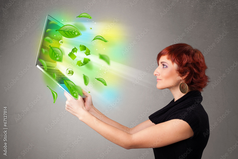 Casual woman holding notebook with recycle and environmental sym Casual woman holding notebook with recycle and environmental sym