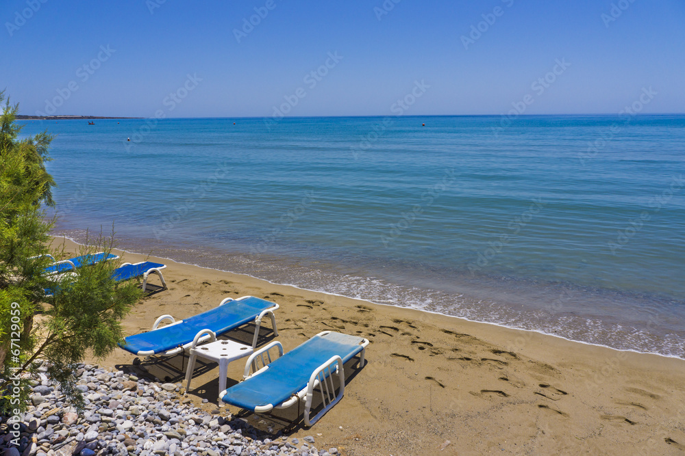 Sea beach with sunbeds