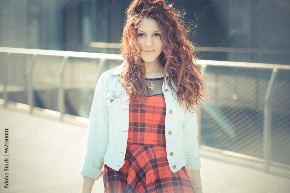 young beautiful hipster woman with red curly hair young beautiful hipster woman with red curly hair