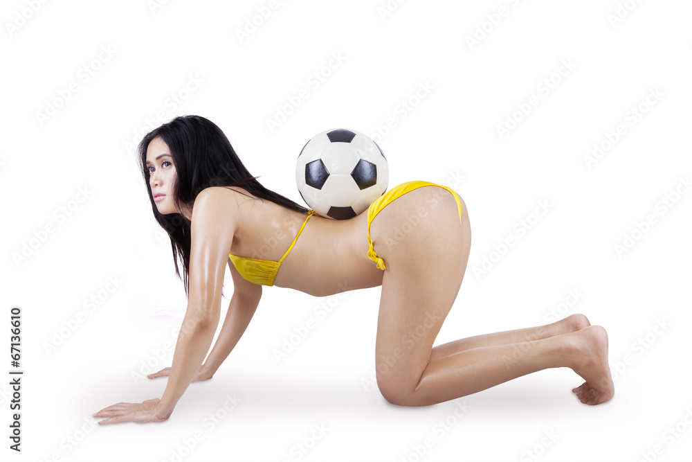 Sexy woman in bikini and soccer ball Stock Photo | Adobe Stock