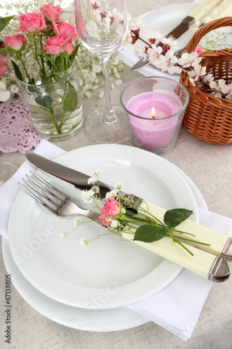Table setting with spring flowers close up