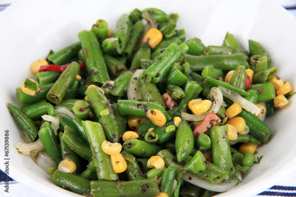 Salad with green beans, ham and corn in bowl, close-up Salad with green beans, ham and corn in bowl, close-up