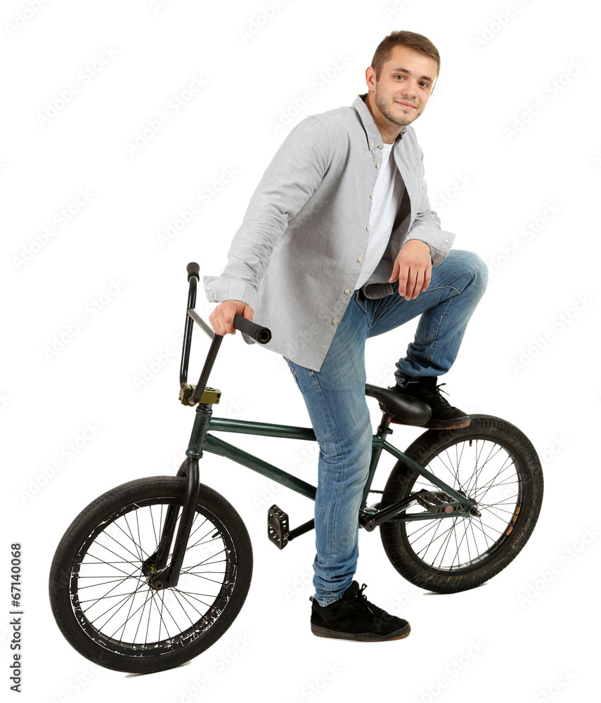 Young boy on BMX bike isolated on white Young boy on BMX bike isolated on white