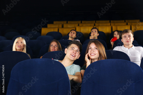 Young people watching movie...