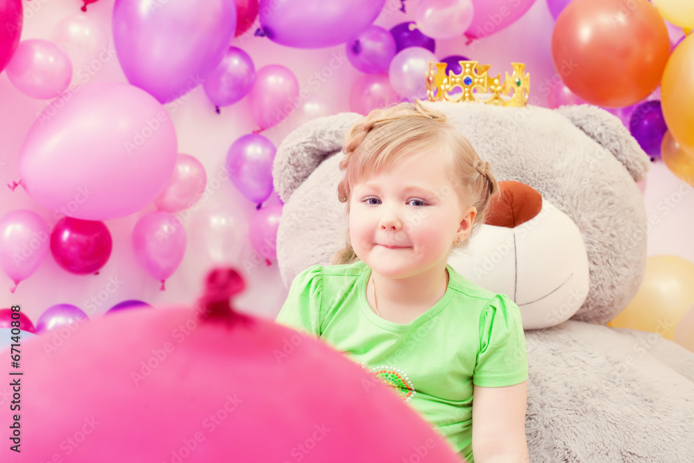 Fototapeta premium Amusing blonde girl posing in playroom