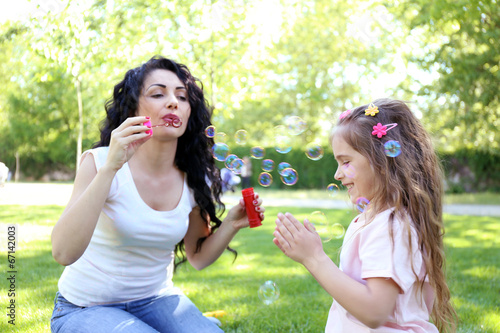 Happy mom and daughter. Wal...