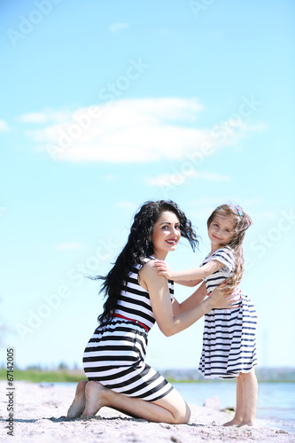 Happy mom and daughter. Wal...