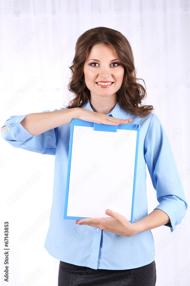 Young business woman in room Young business woman in room