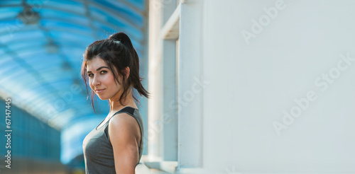 Athletic young woman looking camera Free Download Athletic young woman looking camera - GFXLoad