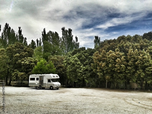 Camper with forest on background photo