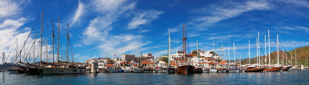 Marmaris city with fortress and marina, view from sea, Turkey