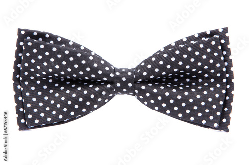 black bow tie with polka dots isolated on white background
