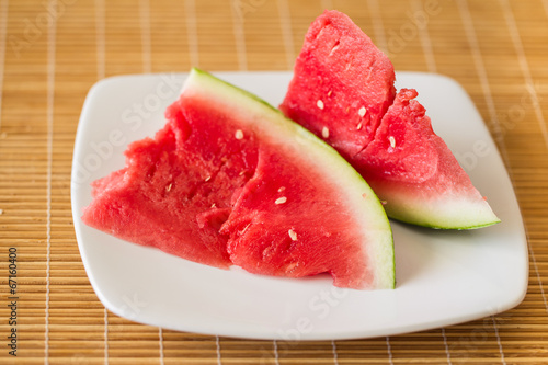 chunky slices of watermelon on a plate