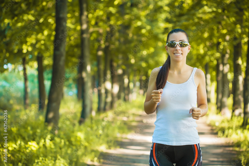 Young woman jogging in nature Young woman jogging in nature