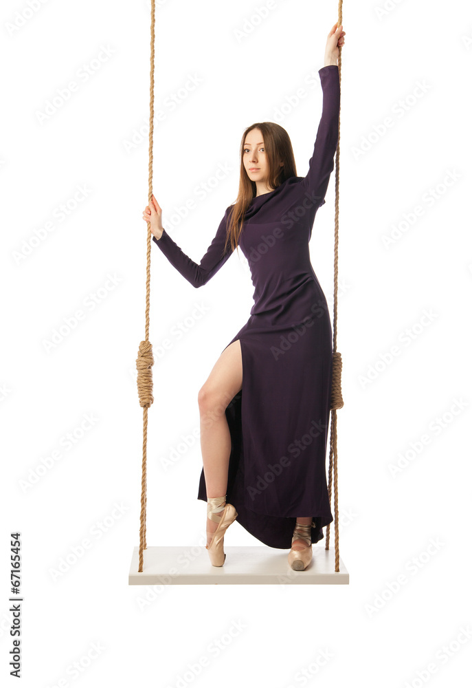 Beautiful ballet dancer posing in studio Beautiful ballet dancer posing in studio