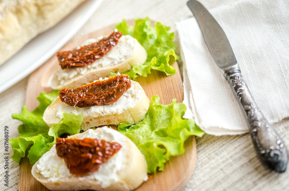 Ciabatta sandwiches with cottage cheese and sun-dried tomatoes