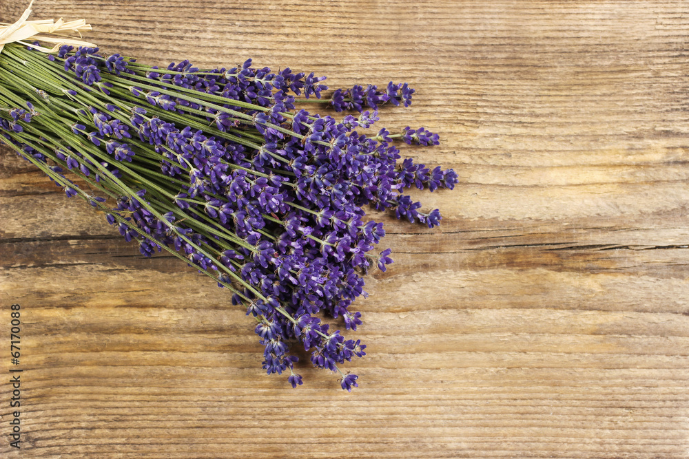 Bunch of lavender on wooden table Bunch of lavender on wooden table