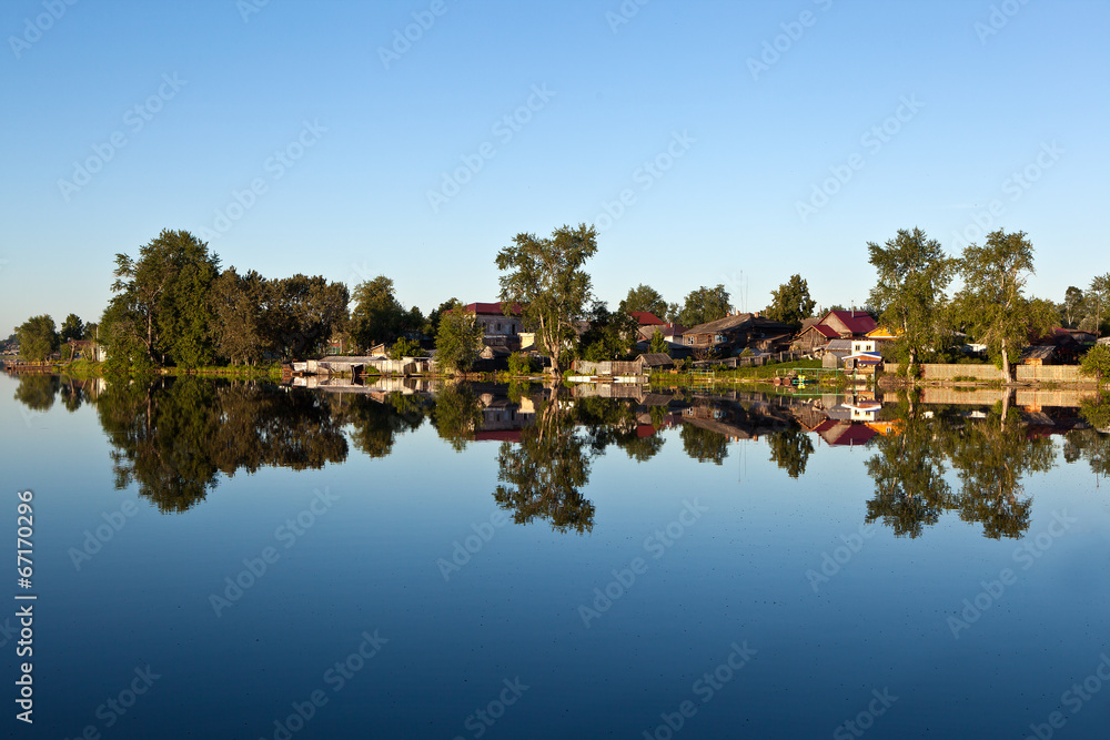 Reflection in water Nevyansk pond. Nevyansk. Russia.