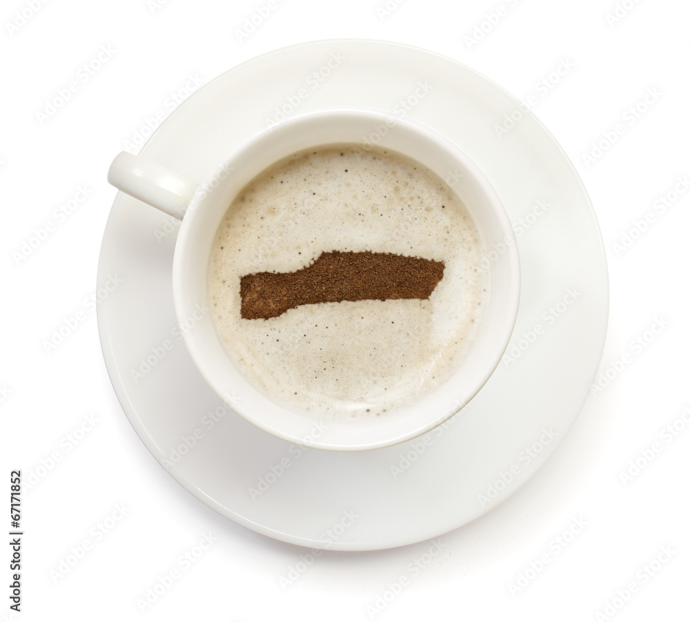 Cup of coffee with foam and powder in the shape of Gambia.(serie Cup of coffee with foam and powder in the shape of Gambia.(serie