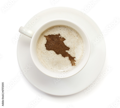 Cup of coffee with foam and powder in the shape of Armenia.(seri