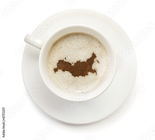 Cup of coffee with foam and powder in the shape of Russia.(serie