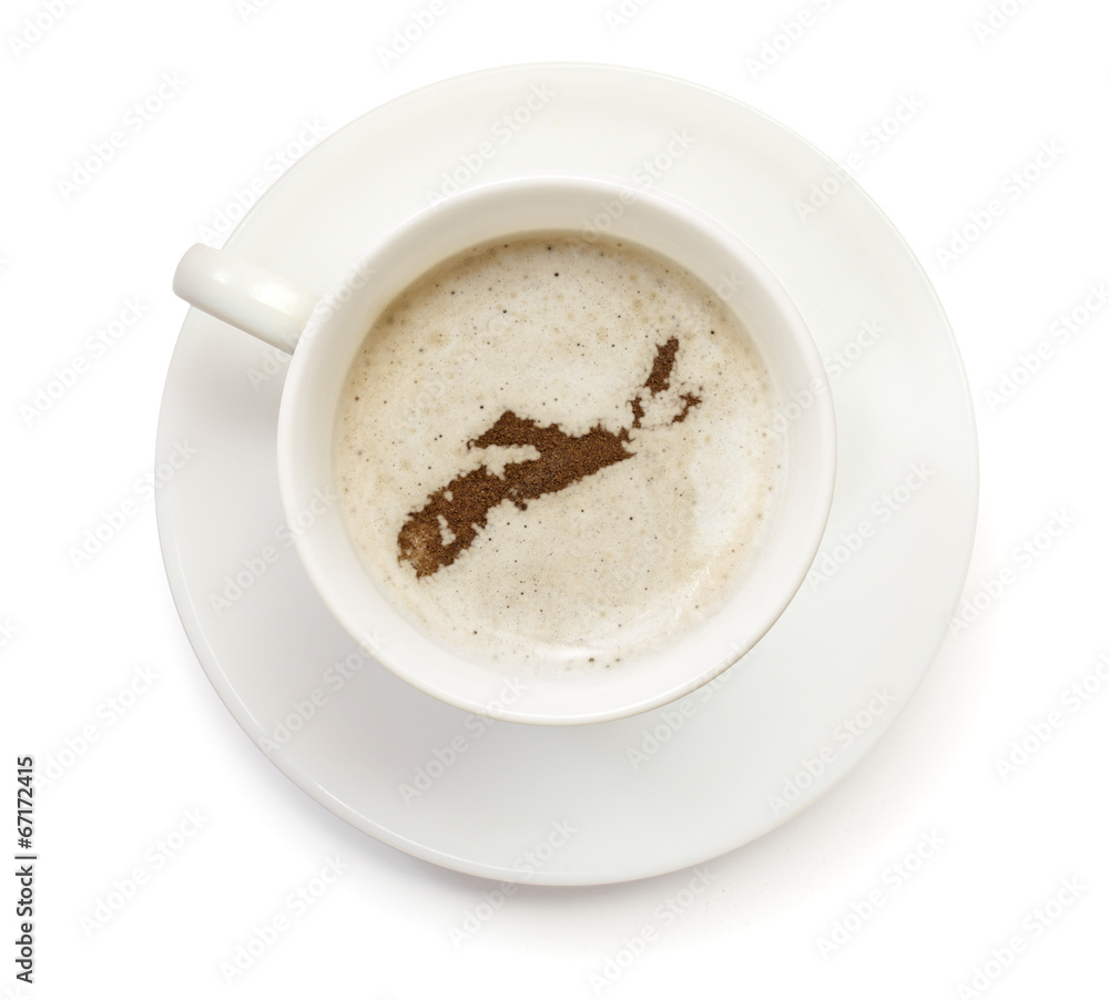 Cup of coffee with foam and powder in the shape of Nova Scotia.( Cup of coffee with foam and powder in the shape of Nova Scotia.(