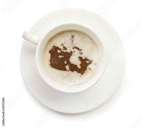 Cup of coffee with foam and powder in the shape of Canada.(serie