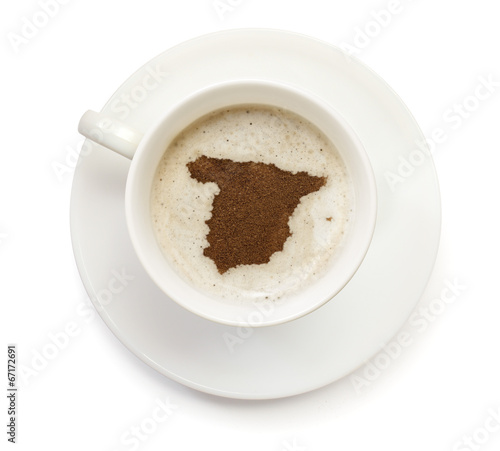 Cup of coffee with foam and powder in the shape of Spain.(series
