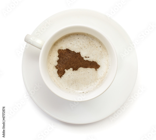 Cup of coffee with foam and powder in the shape of Dominican Rep