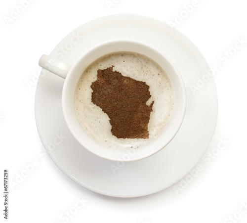 Cup of coffee with foam and powder in the shape of Wisconsin.(se
