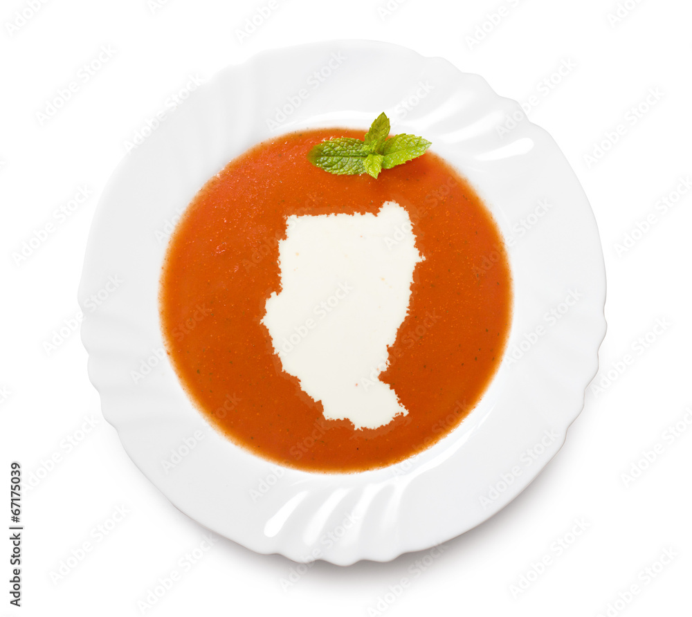 Plate tomato soup with cream in the shape of Sudan.(series) Plate tomato soup with cream in the shape of Sudan.(series)
