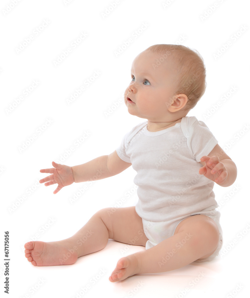 Infant child baby toddler sitting with spread hands Infant child baby toddler sitting with spread hands