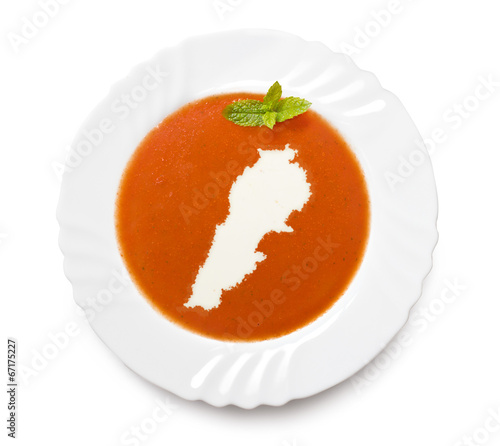 Plate tomato soup with cream in the shape of Lebanon.(series)