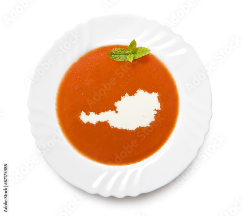 Plate tomato soup with cream in the shape of Austria.(series)