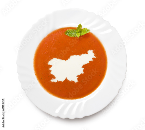 Plate tomato soup with cream in the shape of Slovenia.(series)