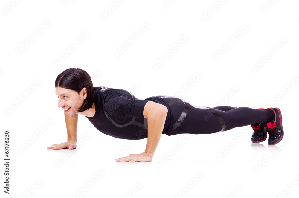 Young man doing exercises on white Young man doing exercises on white