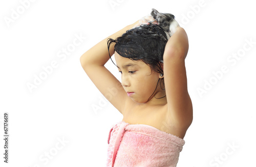 asian  girl shampooing her hair