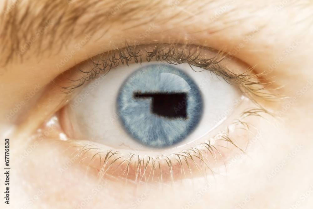 Close-up of an eye with the pupil in the shape of Oklahoma.(seri Close-up of an eye with the pupil in the shape of Oklahoma.(seri