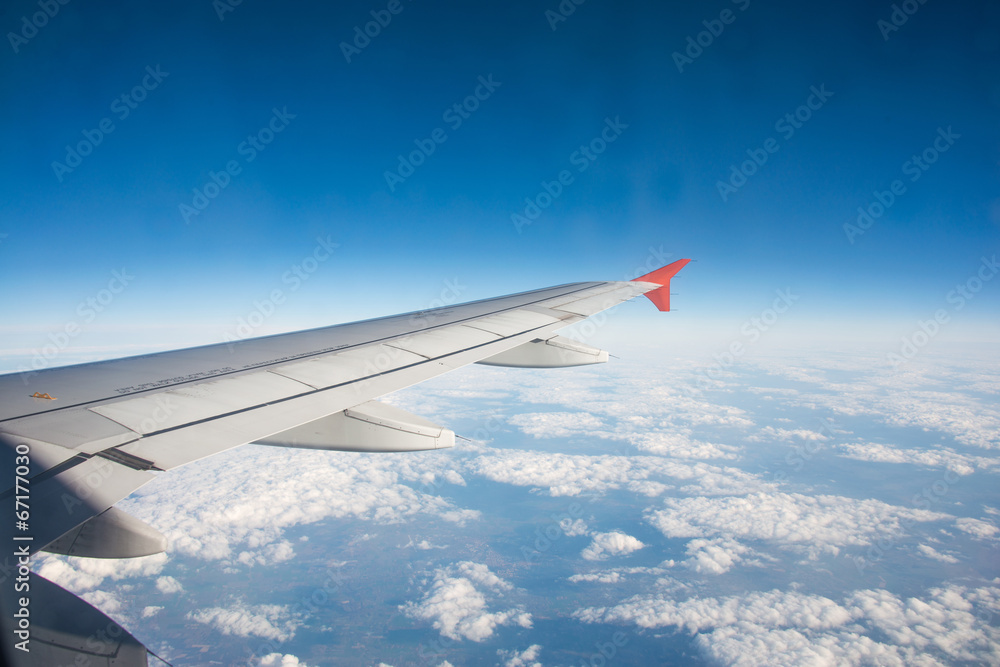 Airplane wing out of window Airplane wing out of window