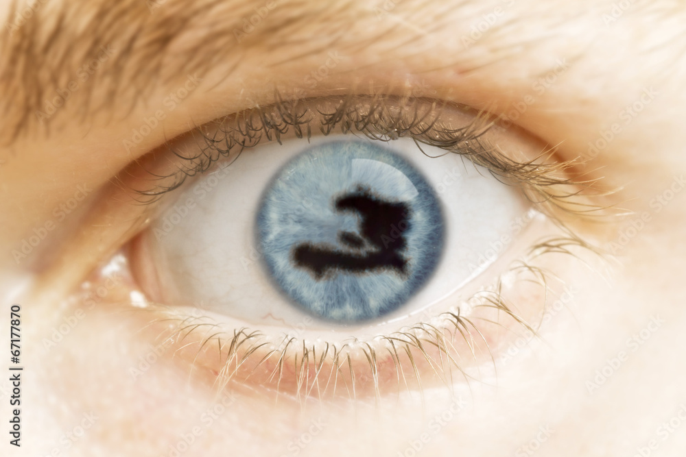 Close-up of an eye with the pupil in the shape of Haiti.(series) Close-up of an eye with the pupil in the shape of Haiti.(series)