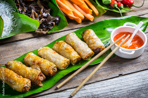 Fried spring rolls surround...