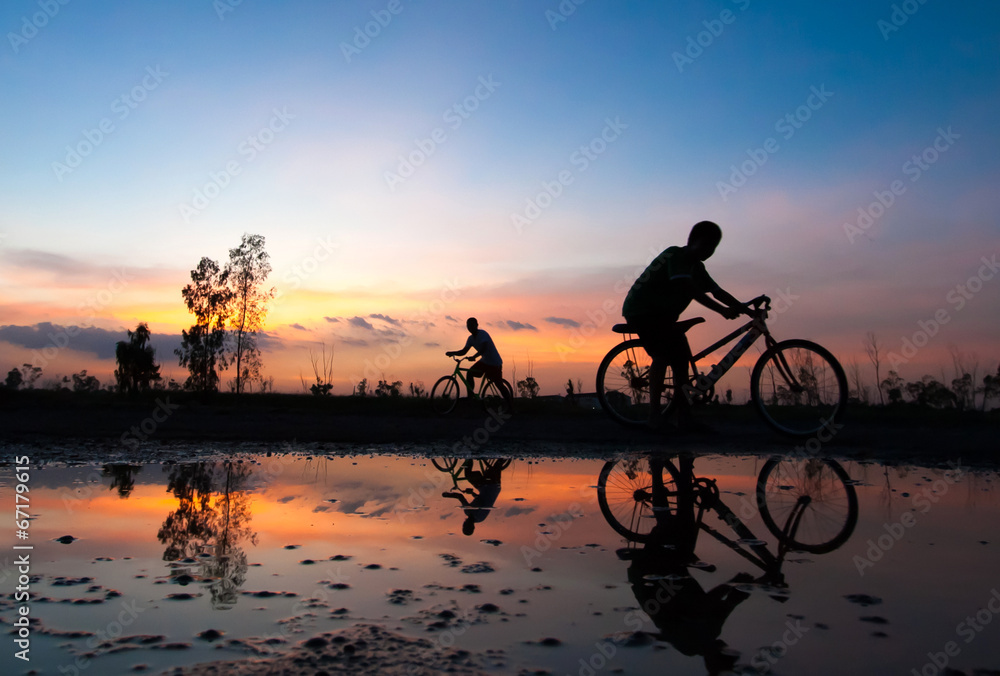 silhouette  cyclist sunset