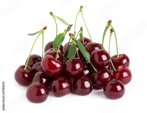 Sweet ripe cherry with leaf on white background