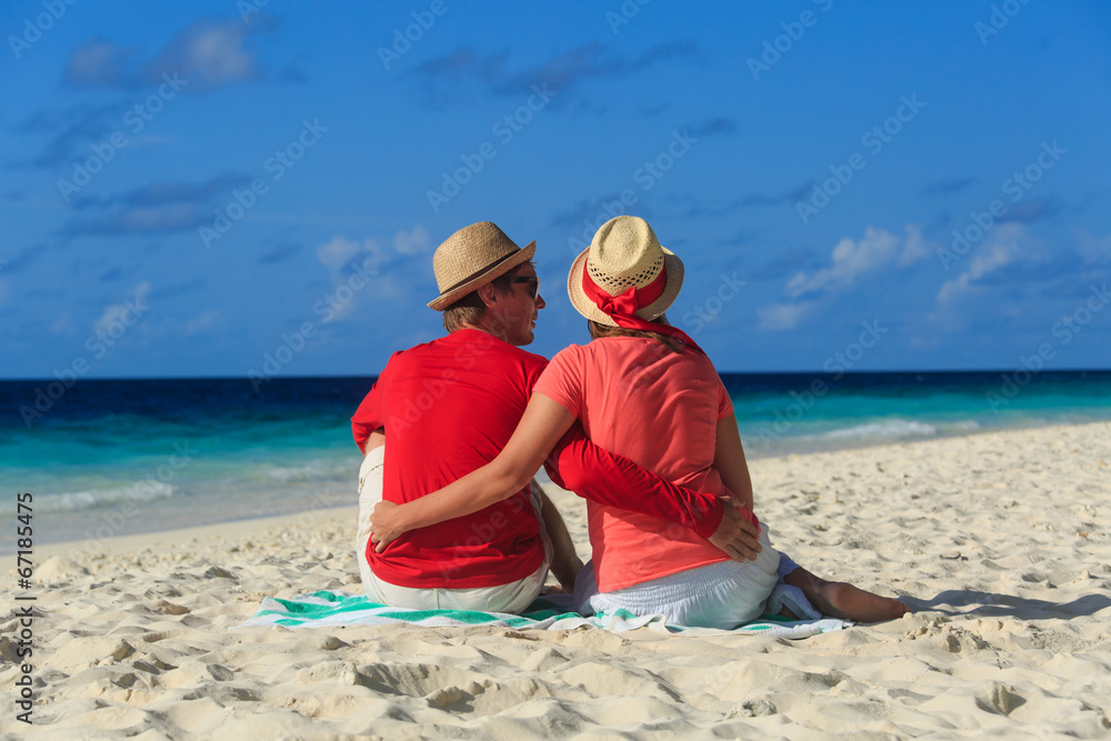 romantic couple on sand beach vacation