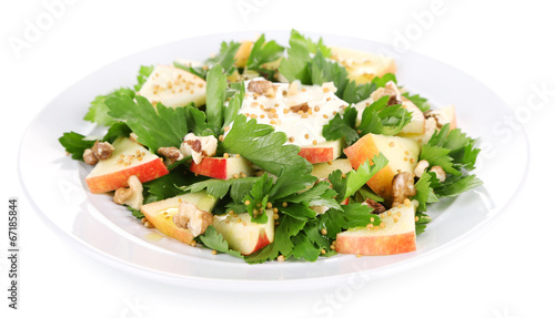 Green salad with apples, walnuts and cheese isolated on white