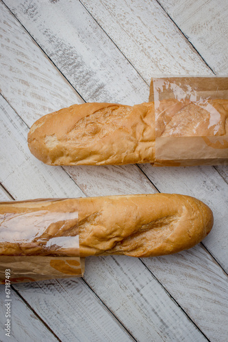 French bread on the wooden background