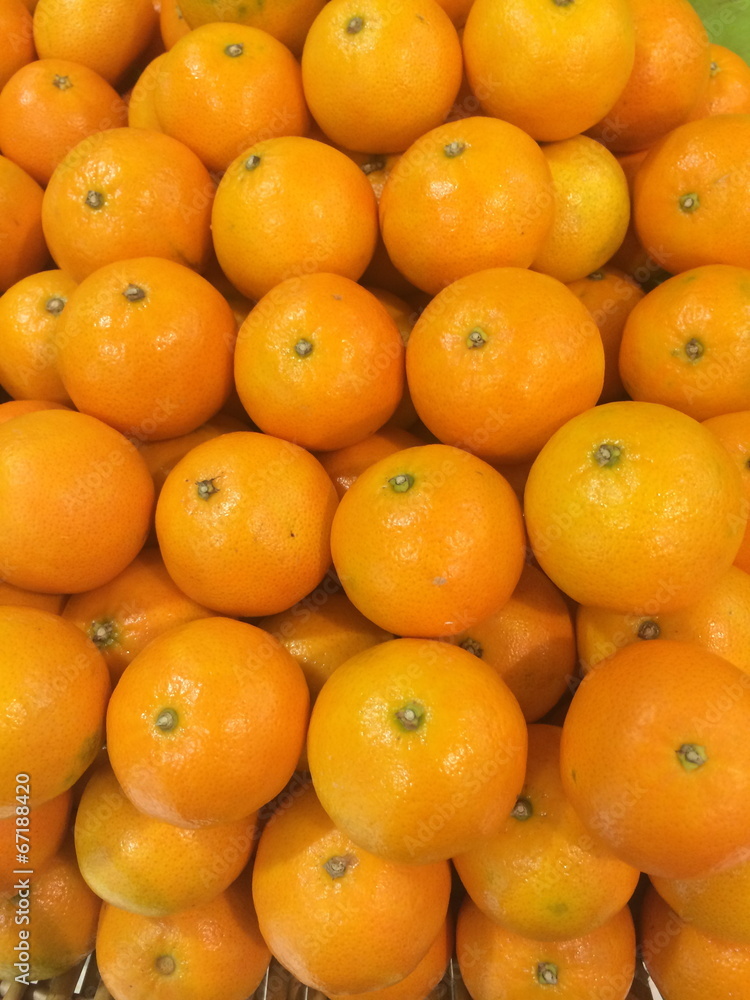 many fresh raw orange