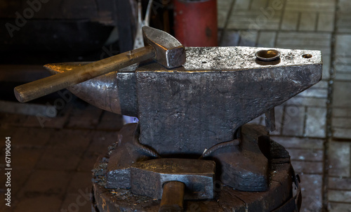 anvil in smithy with gavel photo
