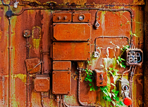 Old electrical panel on iron wall © wlad074